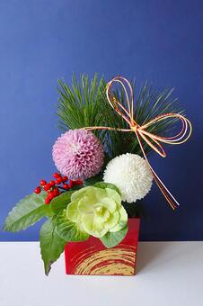 お用月のフラワーアレンジメント フラワーアレンジ,正月,お祝いの写真素材