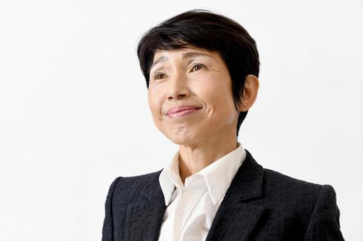 スーツ姿の笑顔のアジア人の中高年の女性 ミドル女性,ビジネス,50代の写真素材