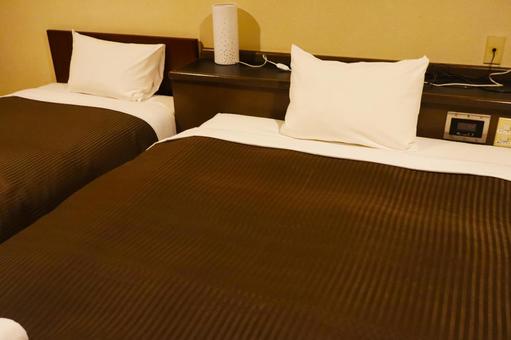 ビジネスホテルのベット　その1 ベッド,ホテル,ビジネスホテルの写真素材