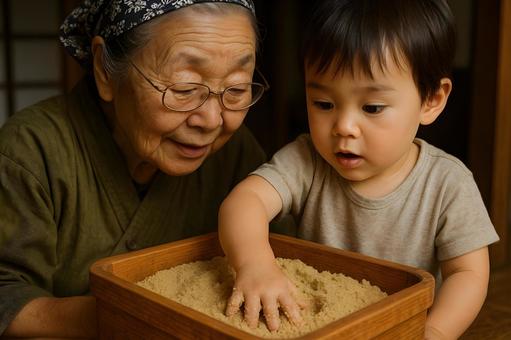 糠床に触れる親子の写真