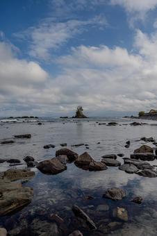 雨晴海岸 雨晴海岸 雨晴海岸,女岩,海の写真素材