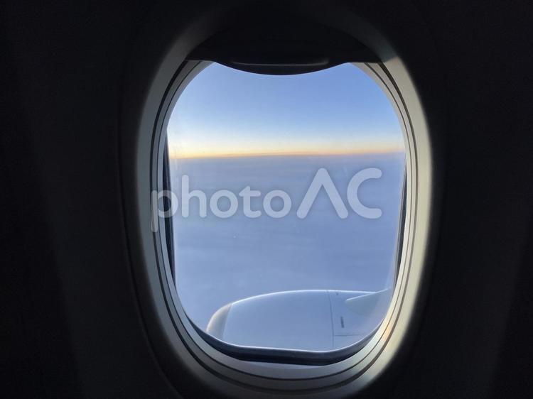 飛行機からのマジックアワー 飛行機,空,雲海の写真素材