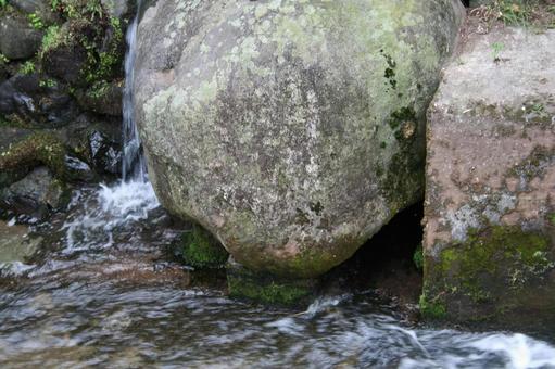 Water flowing through rocks, JPG