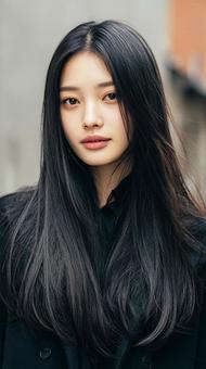 ストレートヘアの若い女性のアップの写真