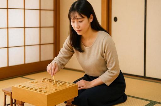 将棋を指す若い女性(和室&正座)・集中 将棋を指す若い女性(和室&正座)・集中の写真