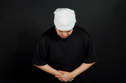 頭にタオルを巻いた男性の謝罪 頭にタオルを巻いた男性の謝罪 謝罪,男性,頭にタオルの写真素材