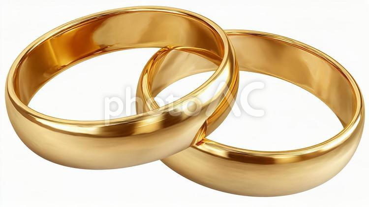 二人の絆を象徴するゴールドの指輪 結婚指輪,指輪,ゴールドの写真素材