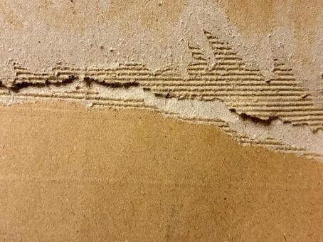 鋭く破れた段ボールの裂け目 段ボール,ダンボール,裂け目の写真素材