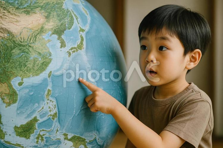 地球儀を指差す子ども 日本列島,日本,地図の写真素材