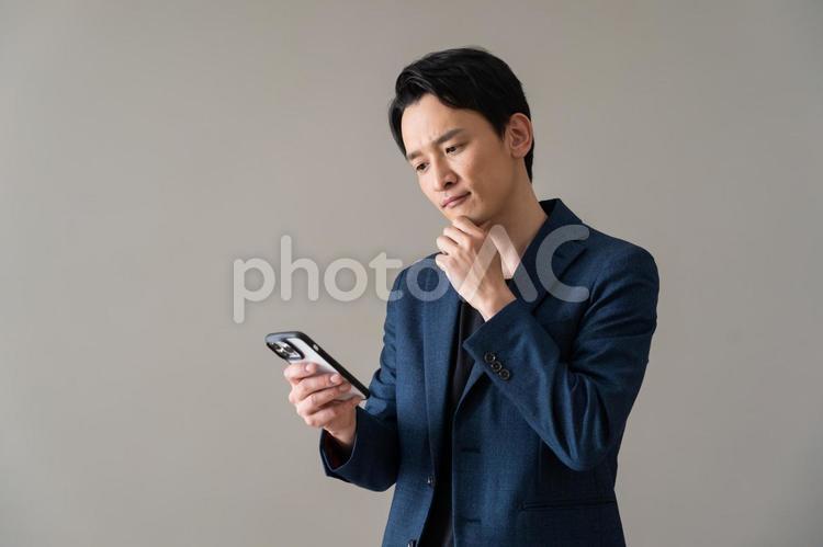 ポーズをとるジャケットを着た男性 ビジネス,ビジネスマン,仕事の写真素材