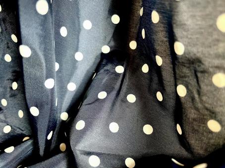 黒字の水玉もようの布素材 黒字の水玉もようの布素材 布,黒,水玉模様の写真素材