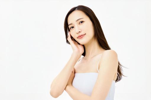 スキンケア 顔を手で触る女性 美容 スキンケア 顔を手で触る女性 美容 スキンケア,顔,美容の写真素材
