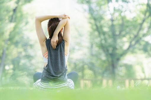 Woman doing yoga stretching in the park, diet, yoga, health, JPG