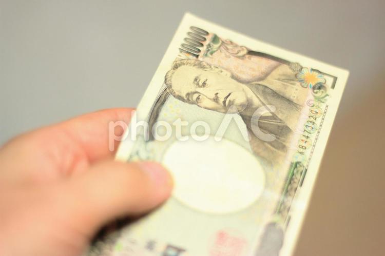 一万円の支払い money,お札,お金の写真素材