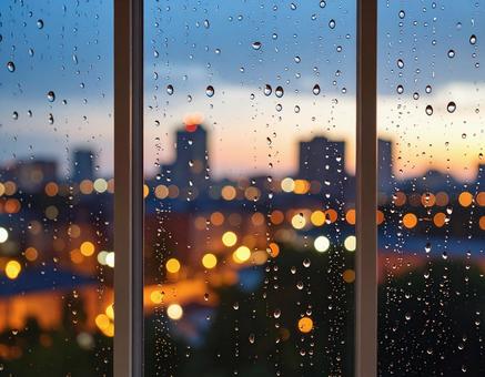ガラス窓の雨と街の光 ガラス窓の雨と街の光の写真
