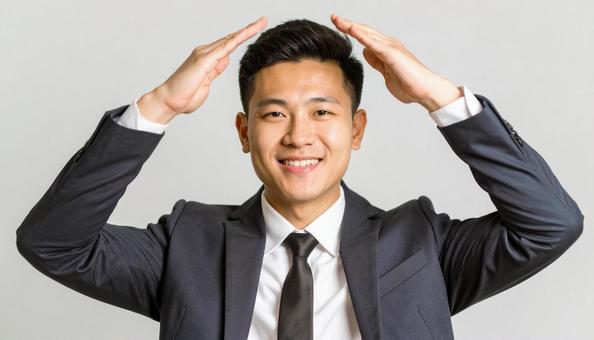 丸のポーズをする日本人サラリーマン 丸のポーズをする日本人サラリーマンの写真