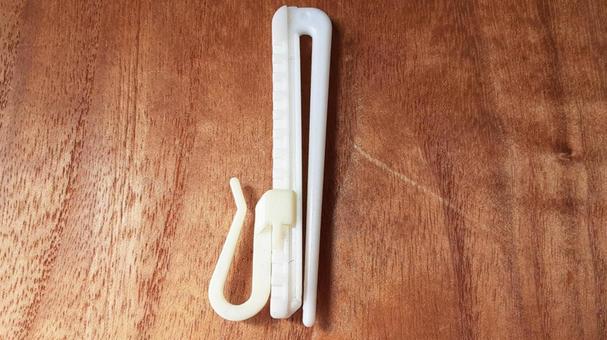 カーテンフックプラスチック カーテンフックプラスチックの写真