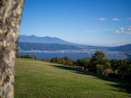 諏訪湖と北アルプスの山々 諏訪湖,湖,快晴の写真素材