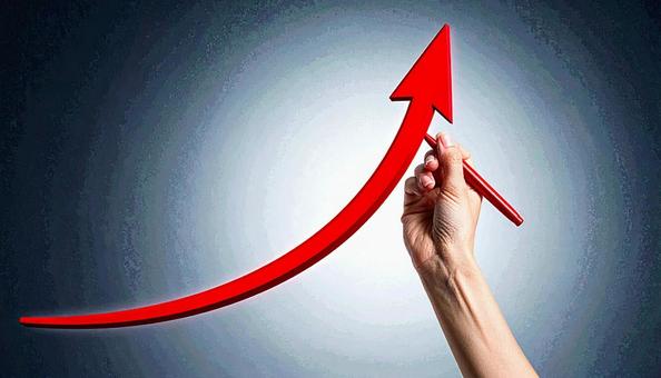 右上がりの上昇カーブを赤ペンで書く女性 右上がりの上昇カーブを赤ペンで書く女性の写真