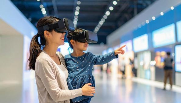 VRゴーグルで博物館展示を見る親子の写真