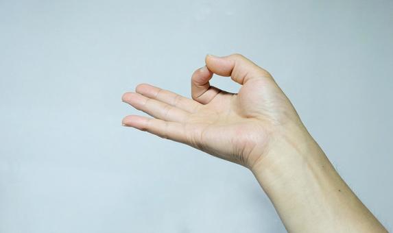 マネーを意味している手のサイン マネーを意味している手のサインの写真
