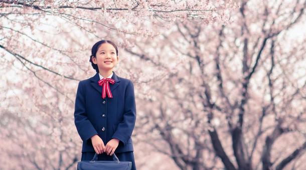 春の桜と笑顔の新入生・入学式・新生活 春の桜と笑顔の新入生・入学式・新生活の写真