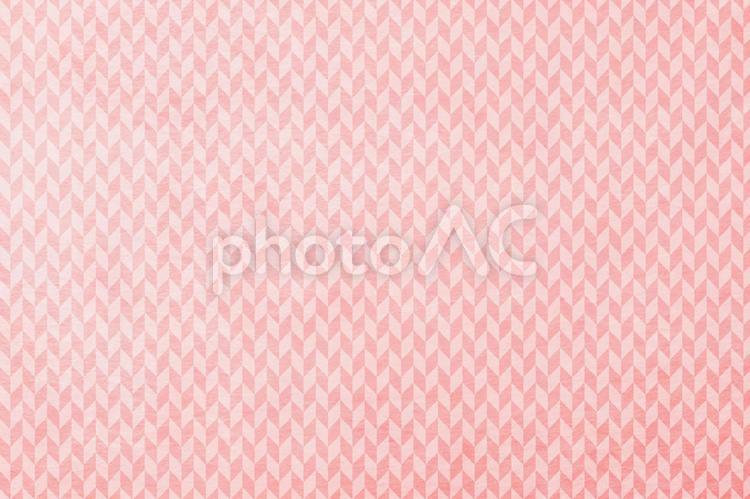 ピンク矢柄の桜色和紙テクスチャ_モダン和柄の背景 和紙,模様,矢の写真素材