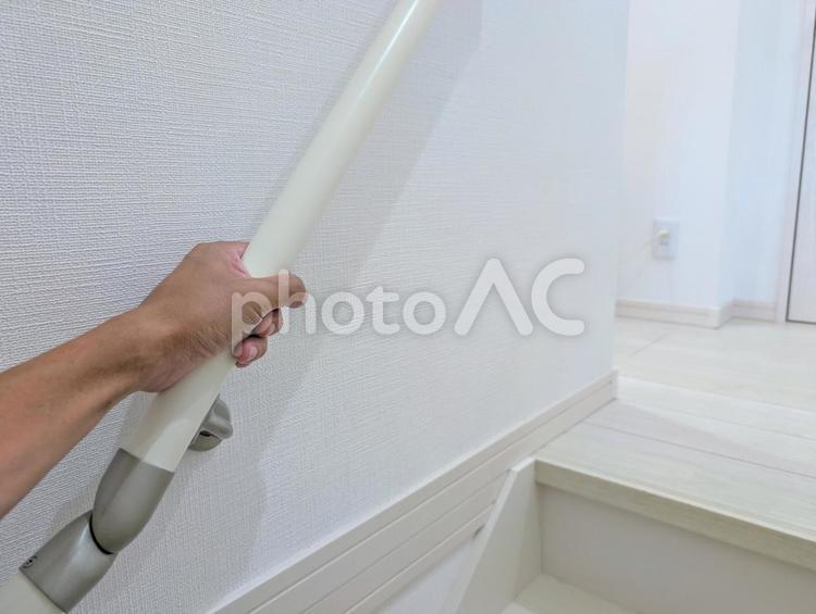階段手すりを掴む 階段,手すり,手摺の写真素材