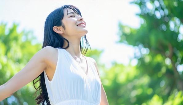 健康的な女性深呼吸 健康的な女性深呼吸の写真