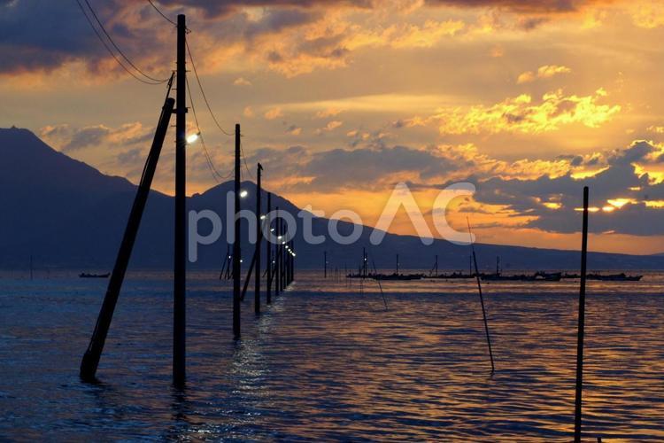 残された灯り 日暮れ,水域,海の写真素材