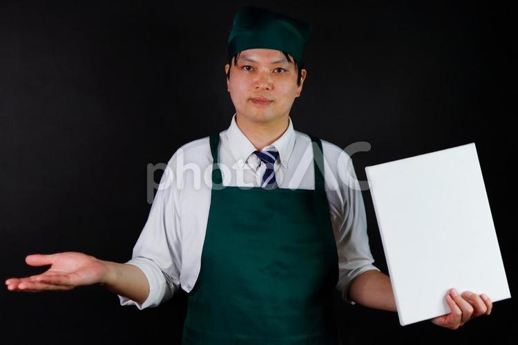 エプロン男性とボード 男性,エプロン,ボードの写真素材