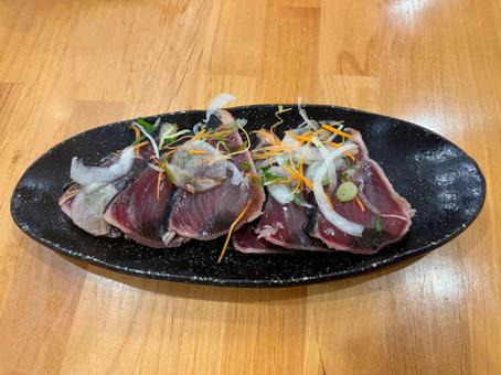 かつおのたたき 居酒屋,居酒屋メニュー,魚料理の写真素材