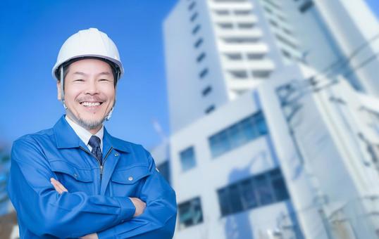 作業着とネクタイを着用した男性作業員 会社,建設現場,作業員の写真素材