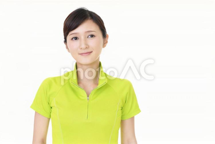 スポーツウェアを着ている笑顔の女性 女性,健康,運動の写真素材
