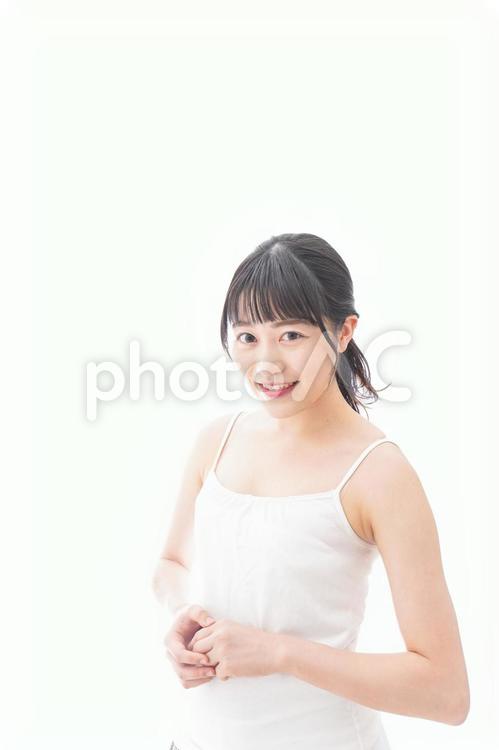 スキンケア・メイクをする若い女性 美容,ビューティー,スキンケアの写真素材