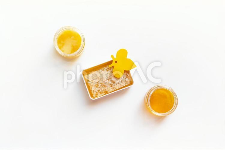 蜂の切り紙と蜂蜜 蜜蝋,弁当箱,容器の写真素材