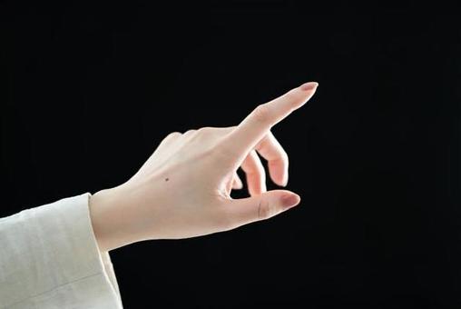 Close-up of the hand of a woman pointing, fem, na rękę, wskazując palcem, JPG