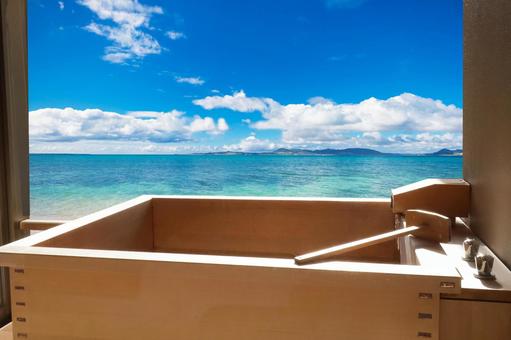 Open-air bath with a view of the sea Open-air bath with a view of the sea