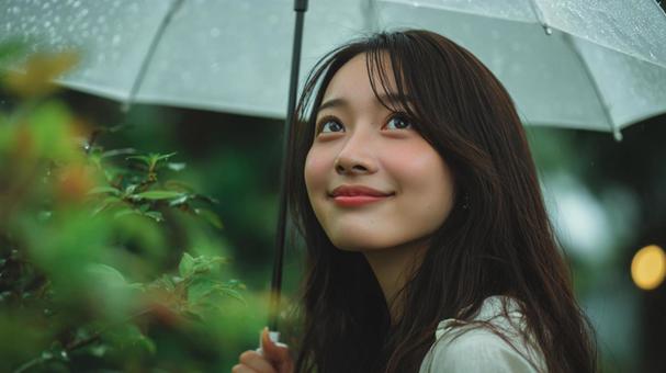 傘をさす女性 傘をさす女性の写真