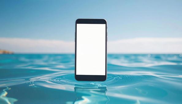 水の上に浮かぶスマートフォン、青空 水の上に浮かぶスマートフォン、青空の写真