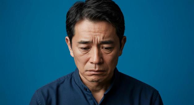 悩む男性 悩む男性の写真