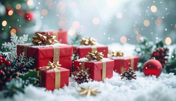 雪の上に並ぶ赤いクリスマスプレゼント 雪の上に並ぶ赤いクリスマスプレゼントの写真
