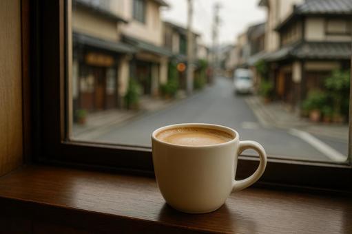 窓越しの街とコーヒー 窓越しの街とコーヒーの写真