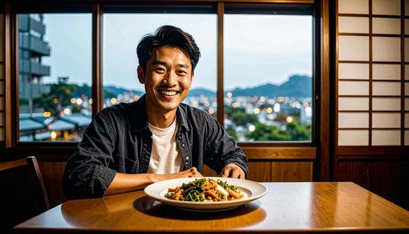 お皿を前に笑顔の男性 お皿を前に笑顔の男性の写真