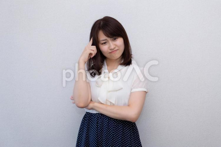 困っている女性 女性,ol,手の写真素材