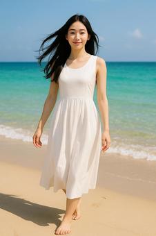 海風に髪をなびかせる白ワンピースの女性 海風に髪をなびかせる白ワンピースの女性の写真