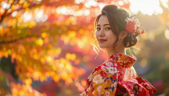 紅葉を眺める晴れ着姿の女性のポートレートの写真