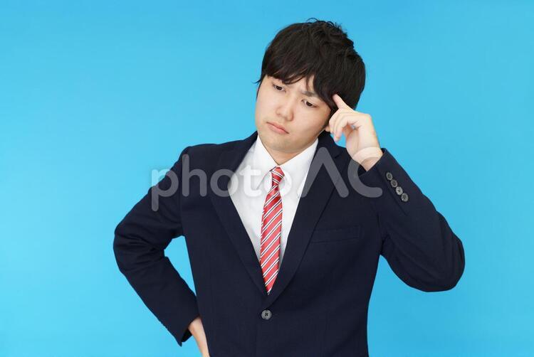 困惑した表情のビジネスマン 男性,ビジネスマン,男の写真素材