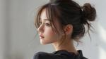横顔のゆるお団子ヘア 人物,髪型,カットモデルの写真素材