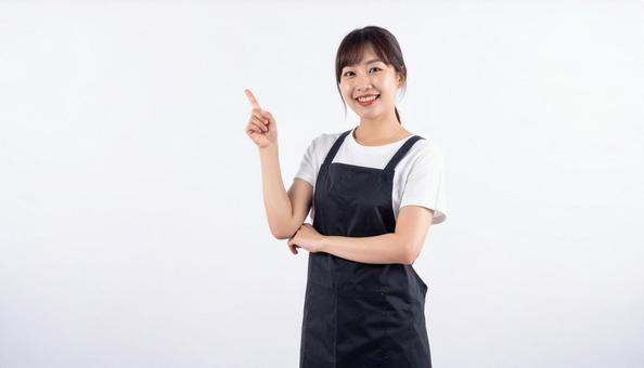 指差しをしている30代の女性 指差しをしている30代の女性の写真